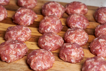 Uncooked pork meatballs