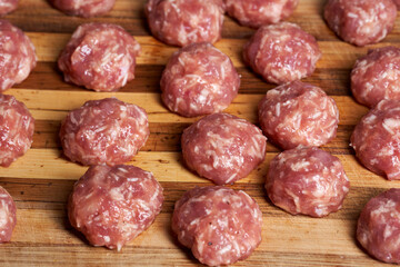 Uncooked pork meatballs