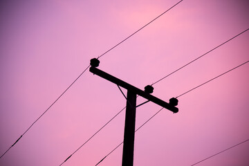 Electric pole on sky background.