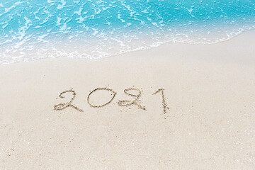 Happy New Year 2021 is coming concept sandy