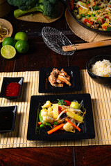 Fried vegetables from the wok with deep fried meat