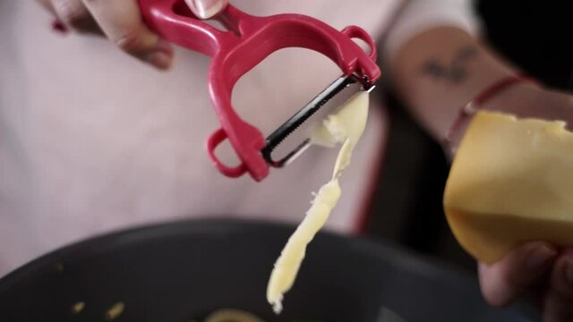 cut hard cheese into slices for salad