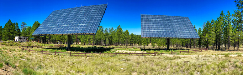 Giant industrial solar panels in the countryside - Panoramic view