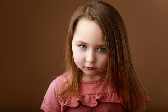 Little girl showing emotion of anger