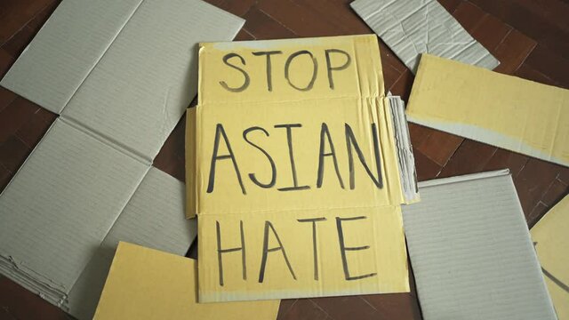 Stop Asian Hate was written on a cardboard