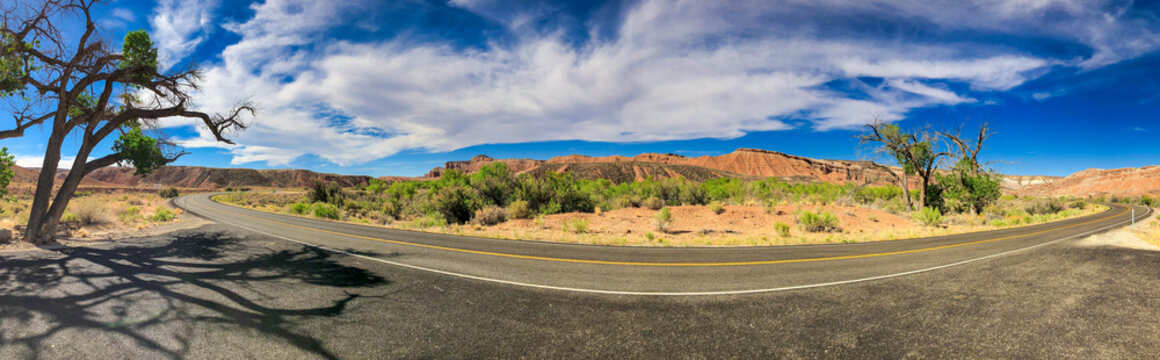 Road across Capitol Reef National Park, Utah in summer season - Panoramic view