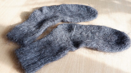 sock and mittens made of sheep wool