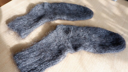 sock and mittens made of sheep wool