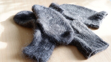 Fototapeta na wymiar sock and mittens made of sheep wool
