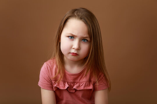 Portrait of preschooler showing emotion of anger