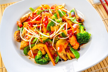 sweet and sour chicken with rice and vegetables