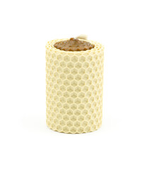 Two-tone scented wax candle isolated on white background. Honey-scented candles