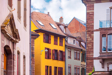Old medieval street with traditional French houses in Strasbourg, France