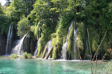 Waterfall, Plitvice Lakes, Croatia, Europe. Ponds and falls in the green vegetation