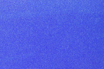 Blue with sequins background. Cornflower blue backdrop. Blue fabric. image of infinity of space or sea depth.