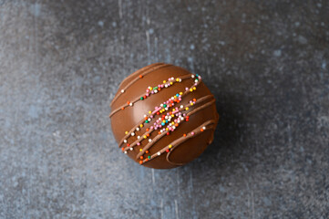 Cocoa bomb with marshmallows, chocolate that melts when hot milk is added for creating a trendy...