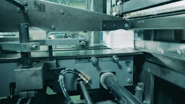 Working paper napkins wrapping machine at a paper plant