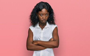 Beautiful african young woman wearing casual clothes skeptic and nervous, disapproving expression...