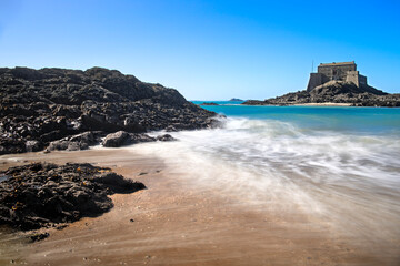 the tide recedes at Grand Bé island in St Malo