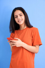 Latin woman with phone in hands