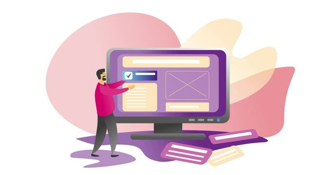 A man collects a website on a computer monitor. Programmer UV UX design.