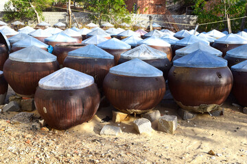 Making fish sauce in Asia. Culinary features of Vietnam