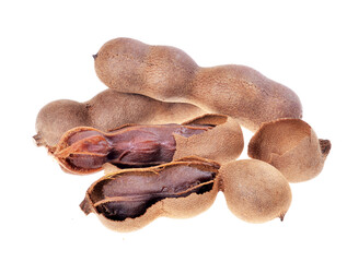 Tamarind pods (Tamarindus indica fruits), pile of, open pod,  isolated on white background. .