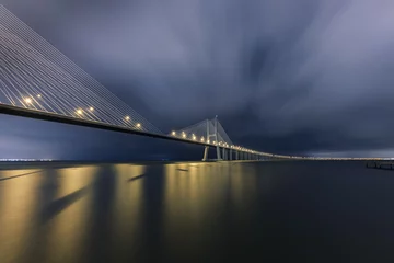 Photo sur Plexiglas Pont Vasco da Gama In the dark hour. Vasco da Gama Bridge, Lisbon, Portugal