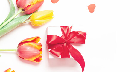 Mother's Day, Women's Day. tulips, gifts on white background