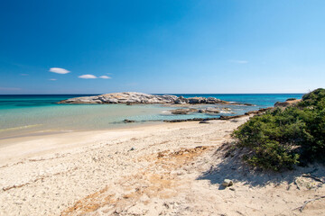 Fototapeta na wymiar crystal clear water and white sand in Scoglio di Peppino beach, Costa rei, Sardinia