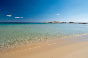 crystal clear water and white sand in Scoglio di Peppino beach, Costa rei, Sardinia
