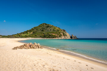 crystal clear water and white sand in Monte Turno beach, Costa rei, Sardinia