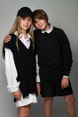 Children style and fashion. Beautiful kids teens in the studio. High quality photo.
