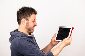 young man uses a tablet