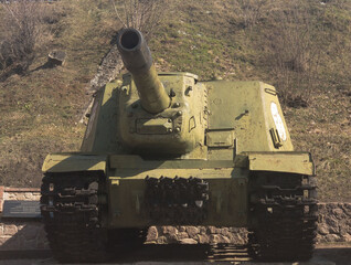 Soviet Self-propelled artillery foreground, light and shadow. Against the background of the hill.