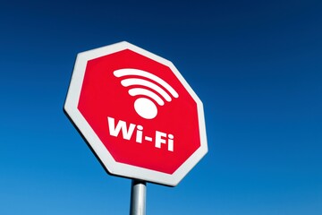 Red stop traffic sign forbidding the use of Wi-Fi and other wireless communication technologies...