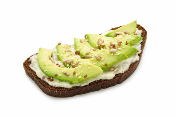 Avocado sandwich on dark rye bread made with fresh sliced avocados isolated on white background.