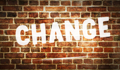 Fototapeta na wymiar Change sign spray painted on the brick wall