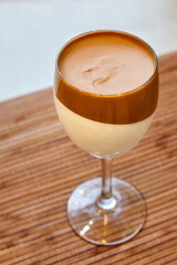 Creamy chocolate dessert in a glass. Close-up, selective focus