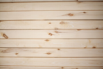 Obraz premium The background is a wall made of wooden beams.Texture for your design