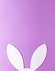 2021 Easter bunny rabbit ears on pastel purple background. Minimal holiday spring concept. Copy space layout.  © Creative Photo Focus