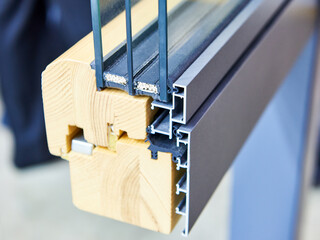 Sectional frame of wooden insulating glass unit