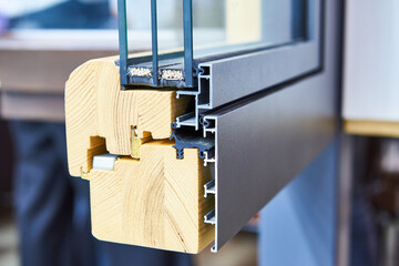 Sectional frame of wooden insulating glass unit