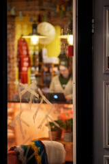 Graffiti on the front window of the store.