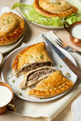 Patties or fried pasty stuffed with minced meat pies.