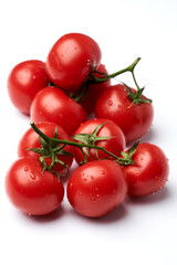 Italian tomatoes on vine isolated on white