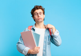young student boy feeling stressed, anxious, tired and frustrated, pulling shirt neck, looking frustrated with problem