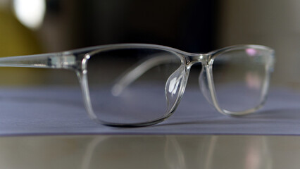 Fototapeta na wymiar Eyeglasses, not new, black rimmed, clear glasses
