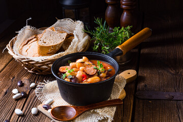 Delicious bean stew with sausage and potato