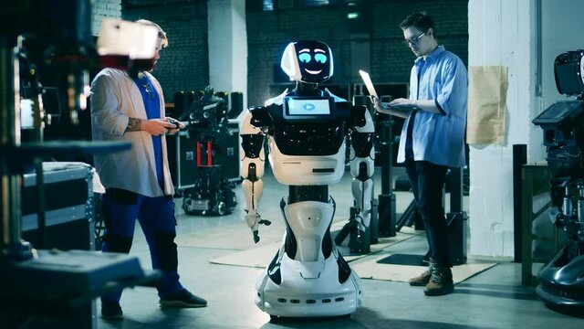 Robotic science, technology, innovations concept. Scientists working on a robot in a lab